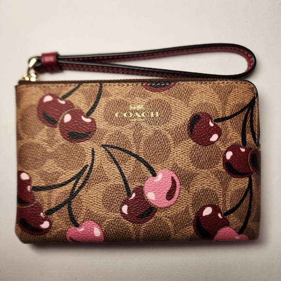 COACH CORNER ZIP WRISTLET IN SIGNATURE CANVAS WITH CHERRY PRINT CZ450 Bags